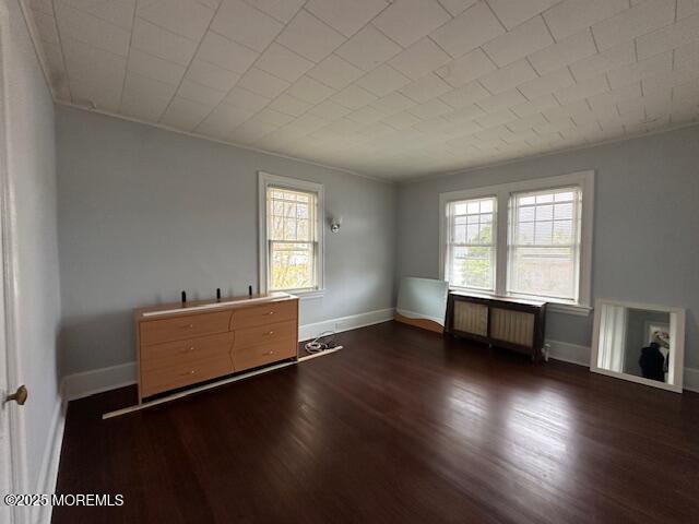 316 Spier Avenue, Unit 2 Allenhurst, NJ 07711 - Photo 4 of 8 an empty room with furniture and windows