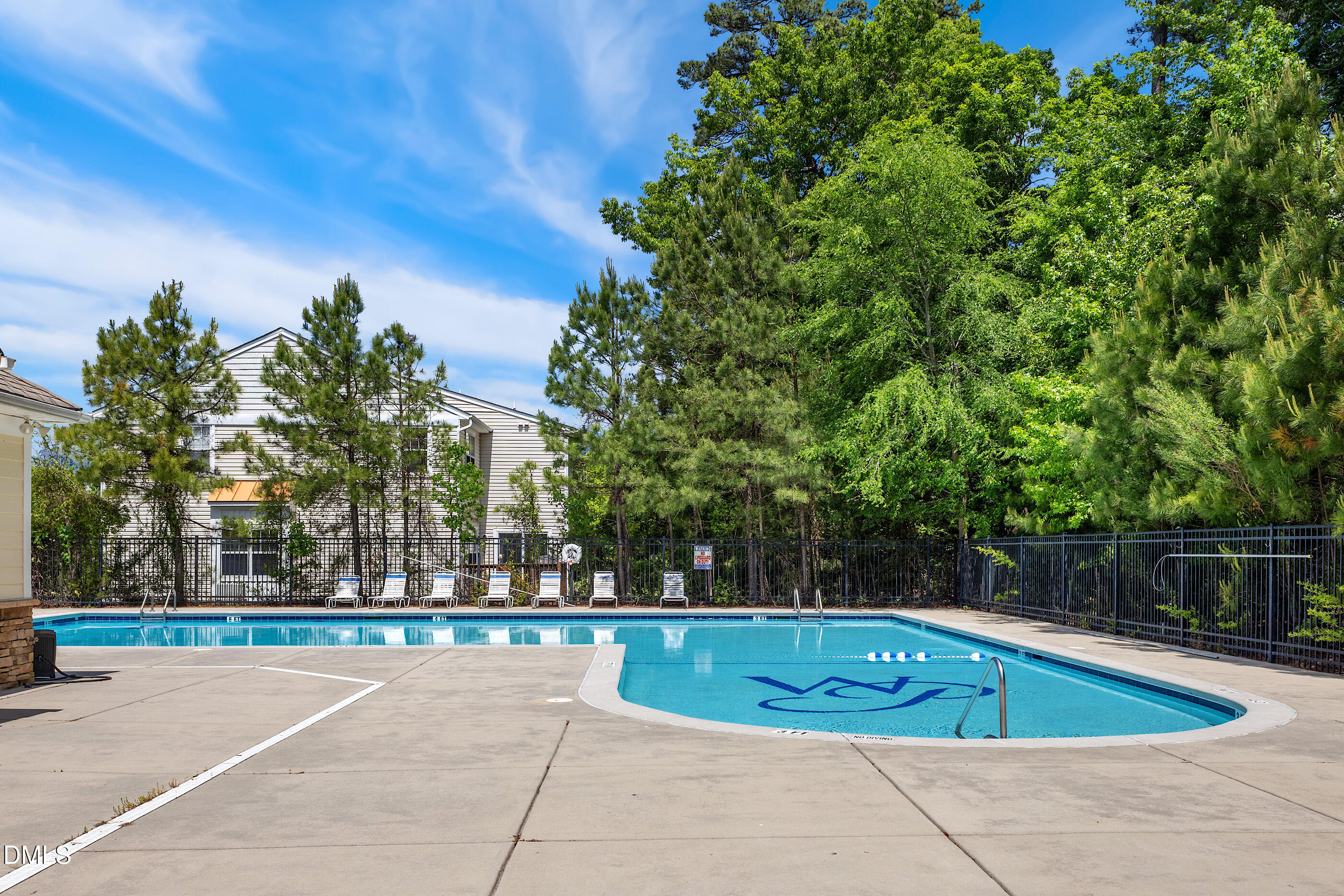 11710 Mezzanine Drive, Unit 101 Raleigh, NC 27614 - Photo 6 of 29 a view of a swimming pool with a yard