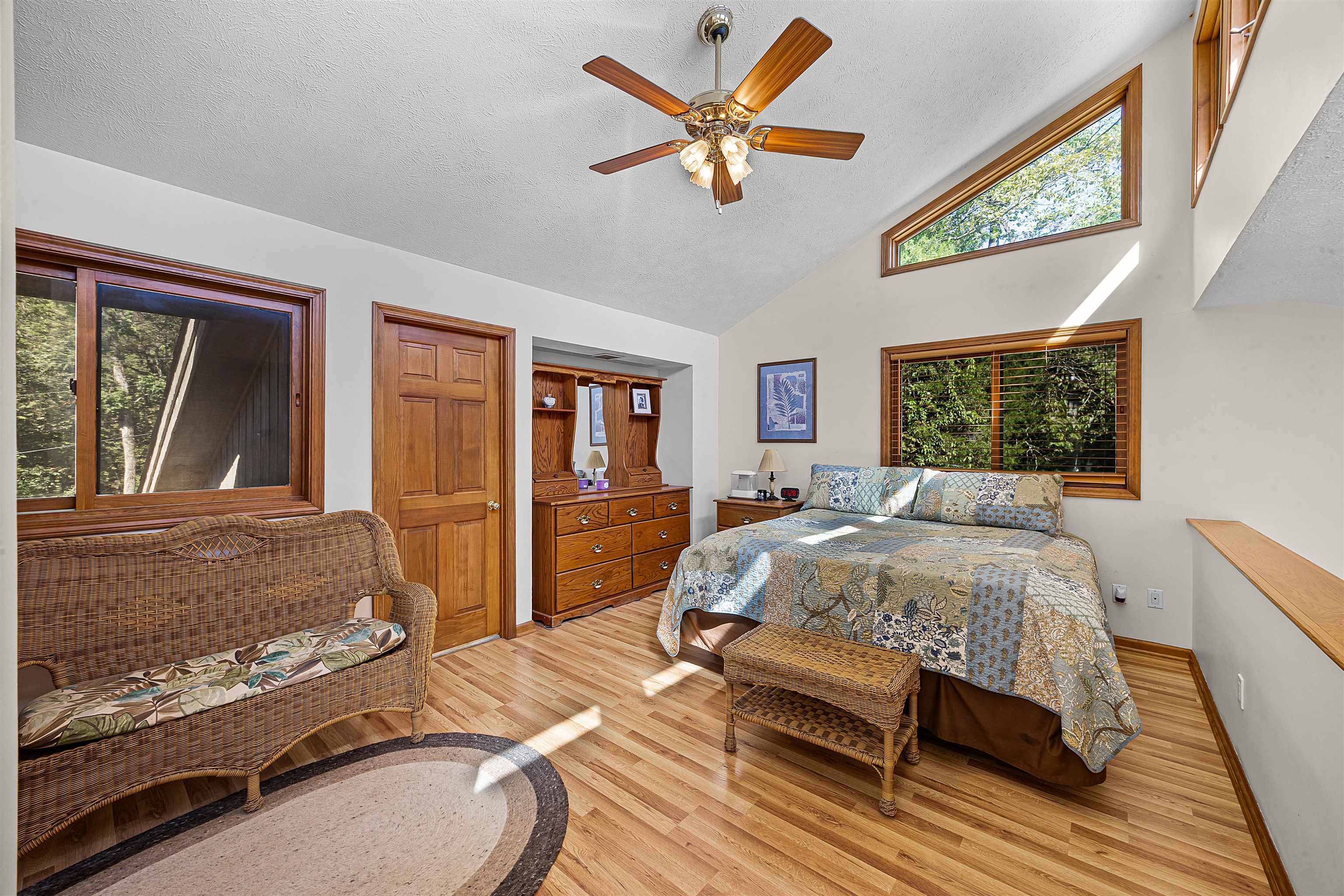 1515 Riverside Lane Adamsville, TN 38310 - Photo 11 of 34 a bedroom with a bed and a large window