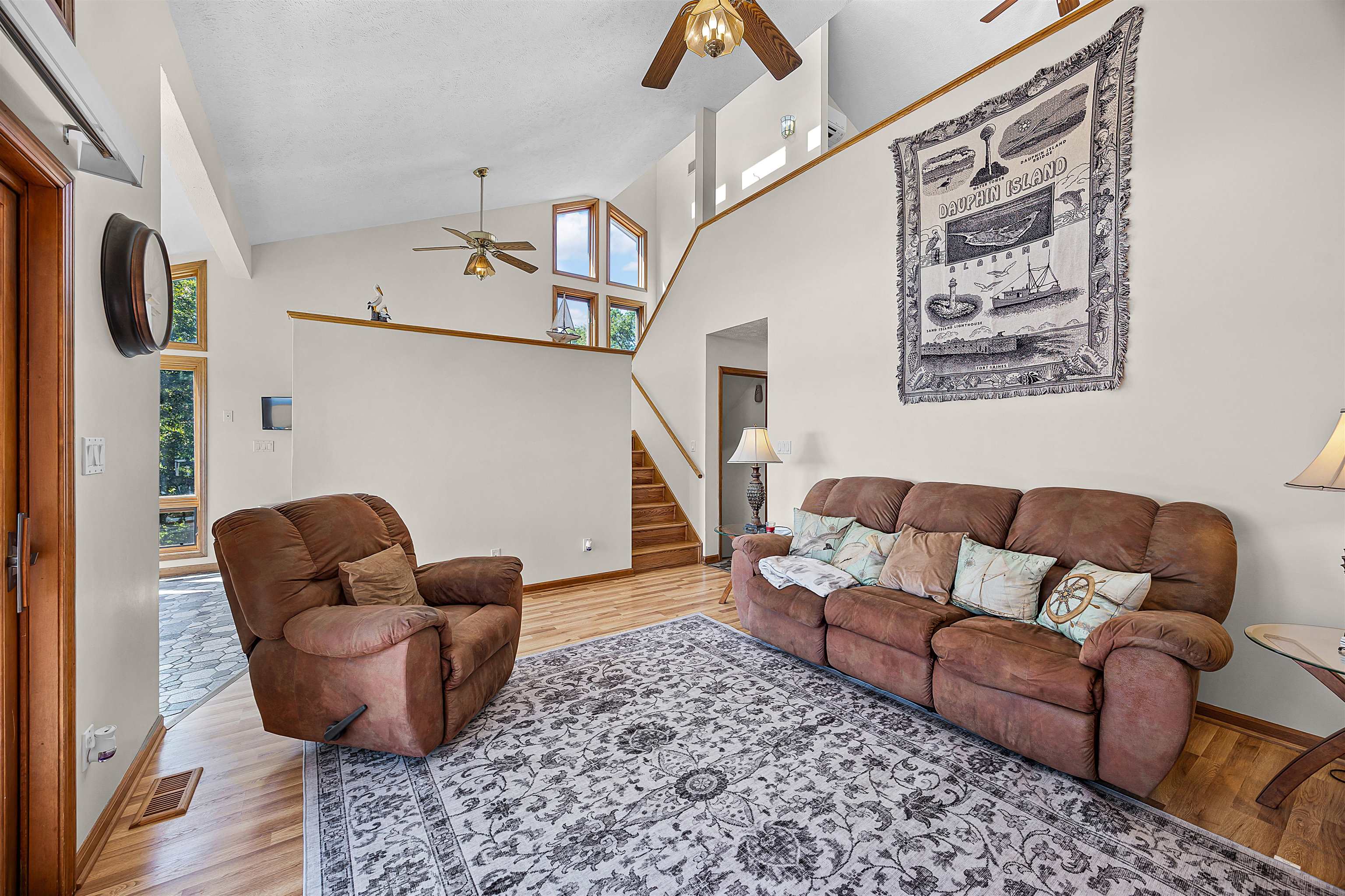 1515 Riverside Lane Adamsville, TN 38310 - Photo 20 of 34 a living room with furniture and a painting
