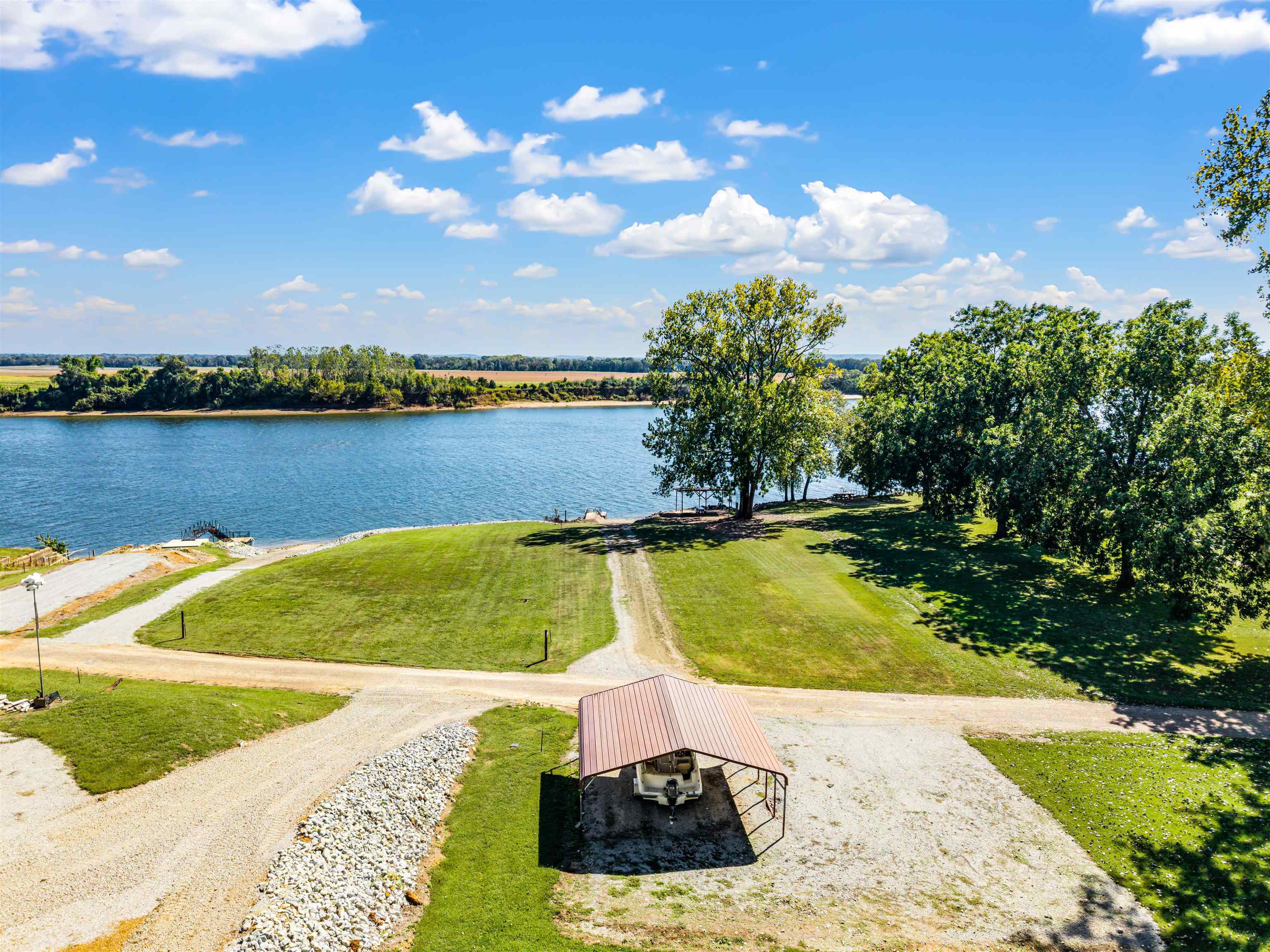 1515 Riverside Lane Adamsville, TN 38310 - Photo 2 of 34 a view of a swimming pool and an outdoor space