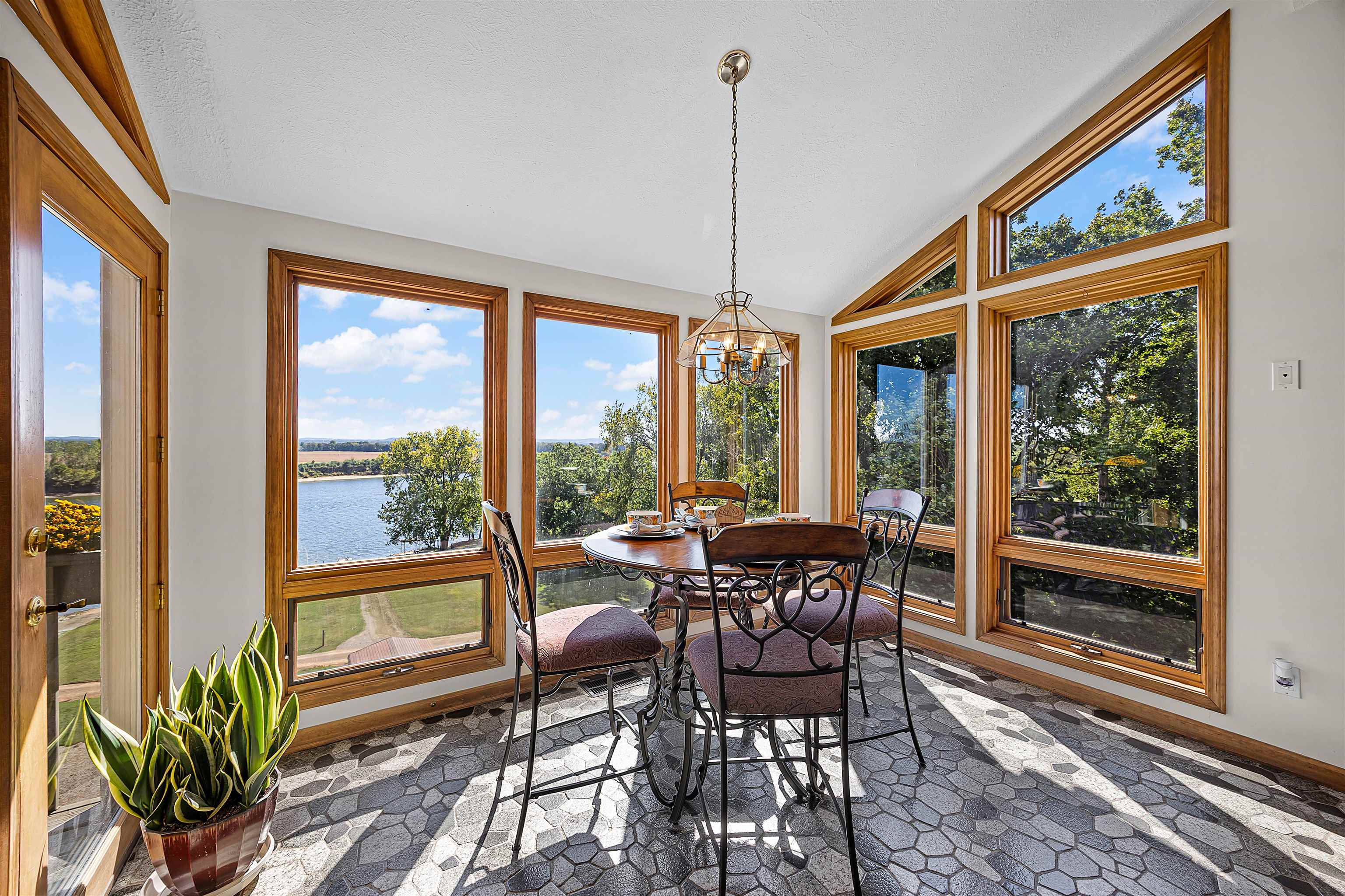 1515 Riverside Lane Adamsville, TN 38310 - Photo 21 of 34 a view of a dining room with furniture window and outside view