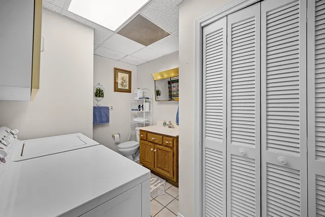 a bedroom with a bed and a cabinets