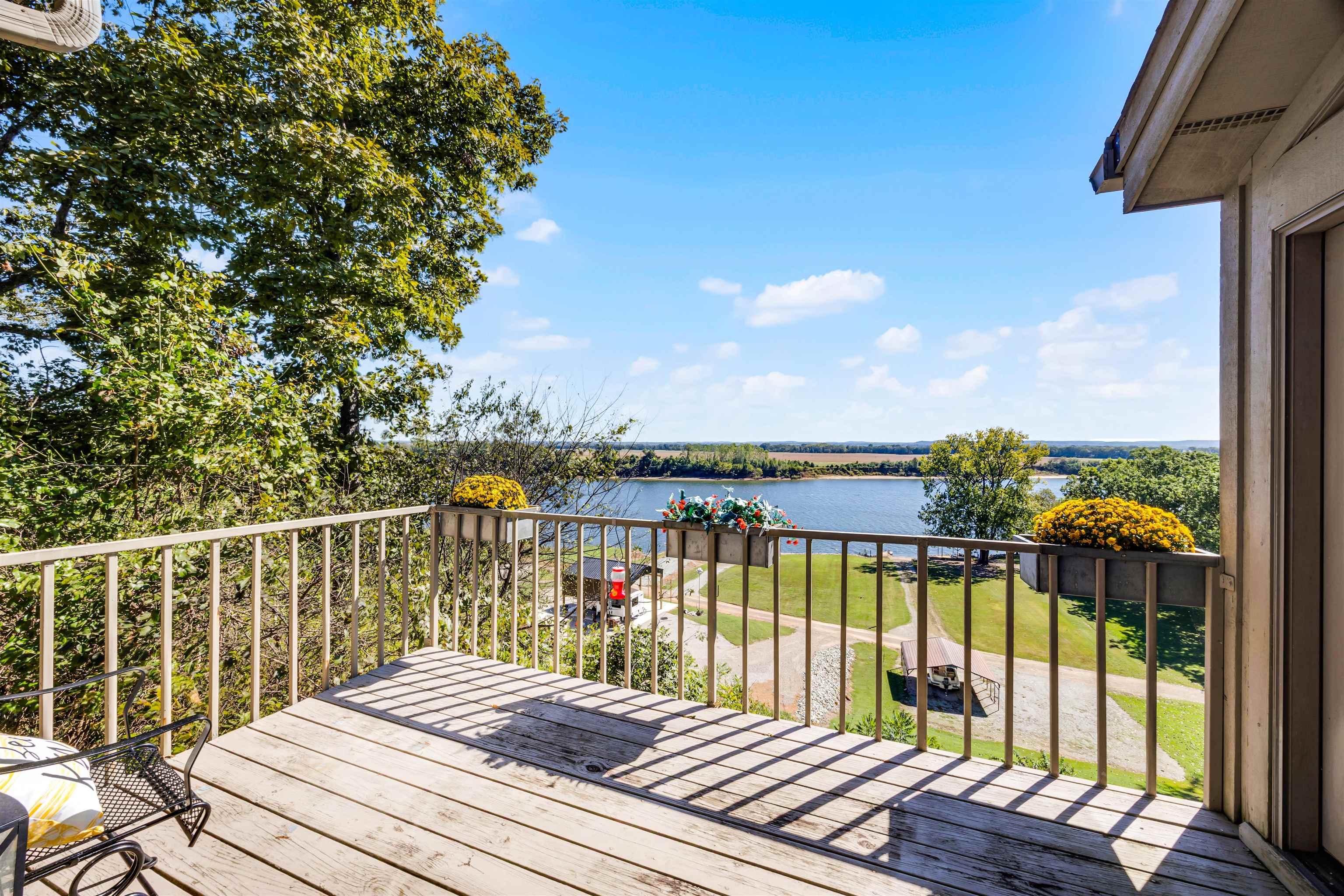 1515 Riverside Lane Adamsville, TN 38310 - Photo 27 of 34 a view of a balcony next to a lake view