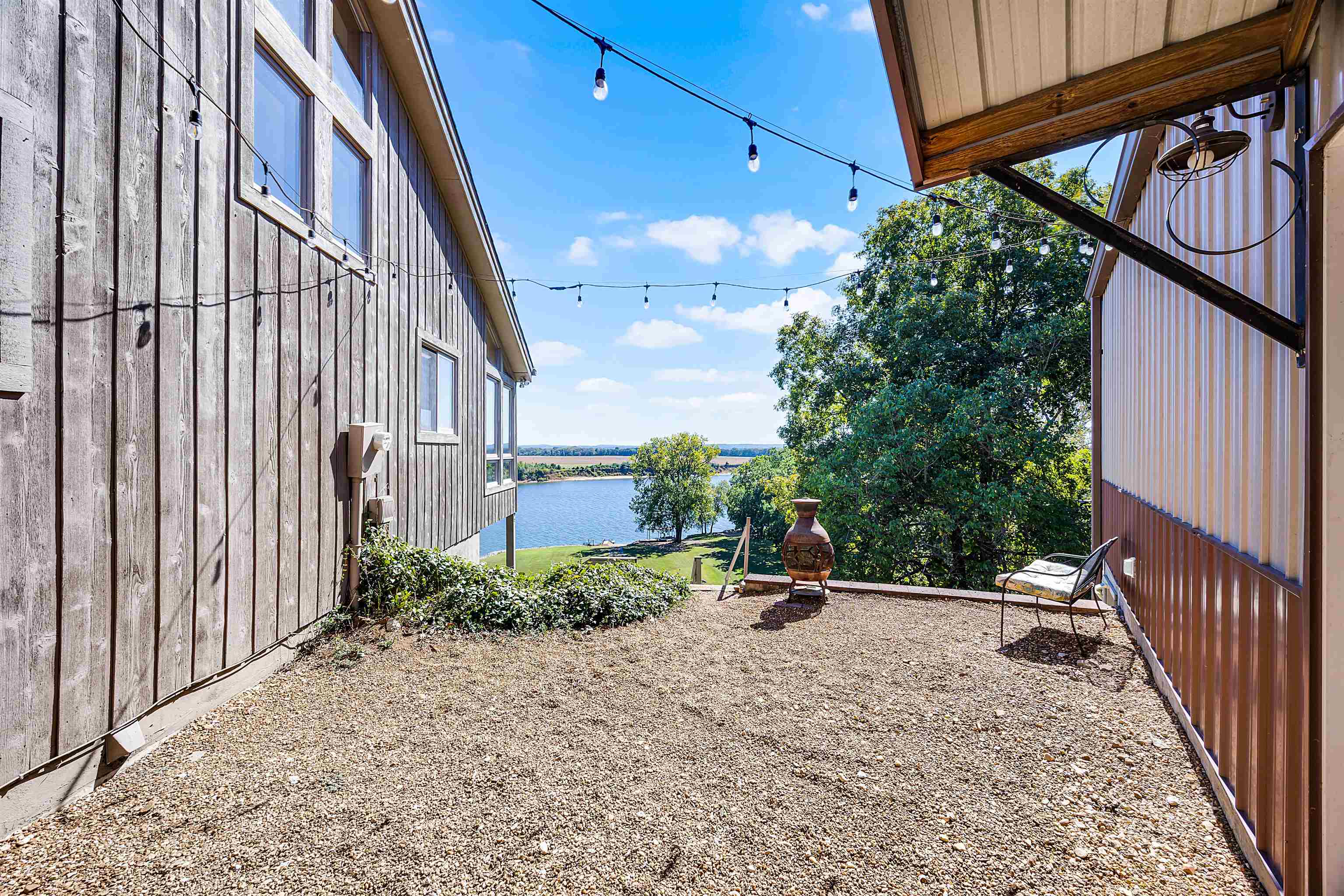 1515 Riverside Lane Adamsville, TN 38310 - Photo 32 of 34 a view of outdoor space with deck and outdoor seating