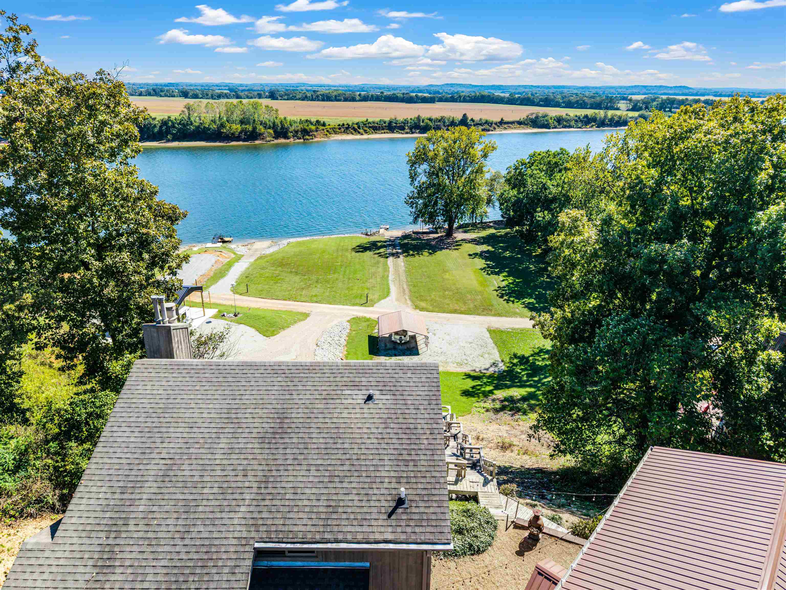 1515 Riverside Lane Adamsville, TN 38310 - Photo 34 of 34 a view of a lake from a balcony