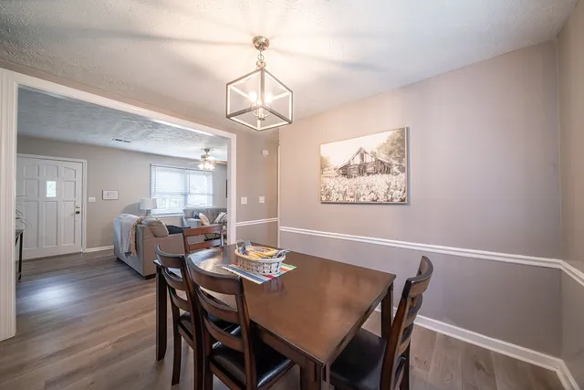 a bedroom with two beds and a window