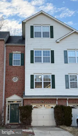 a front view of a house with a balcony