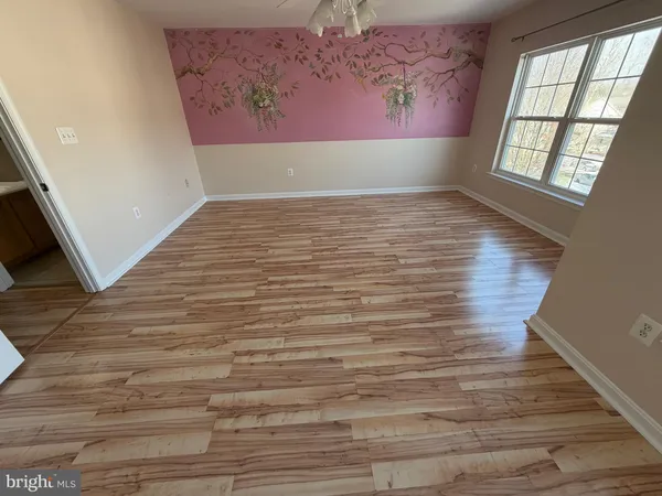 a view of a hallway with windows