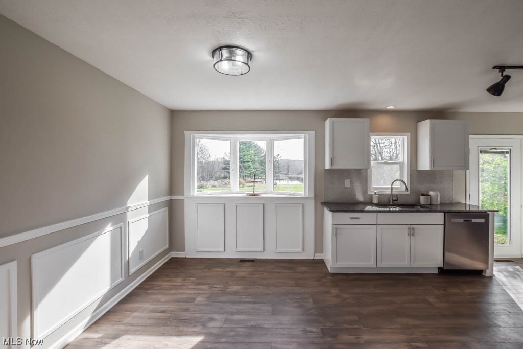 7004 Streeter Road Windham, OH 44288 - Photo 5 of 31 Kitchen with white cabinets, and sink