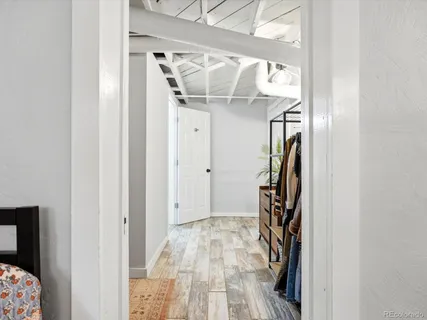 a view of entryway with wooden floor
