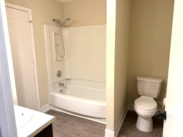 a view of a hallway with front door