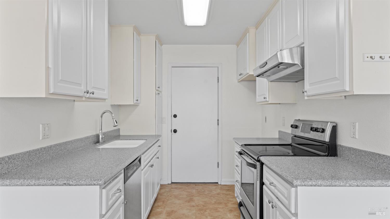 2306 Maher Drive Santa Rosa, CA 95405 - Photo 12 of 28 a kitchen with stainless steel appliances granite countertop a sink stove and refrigerator