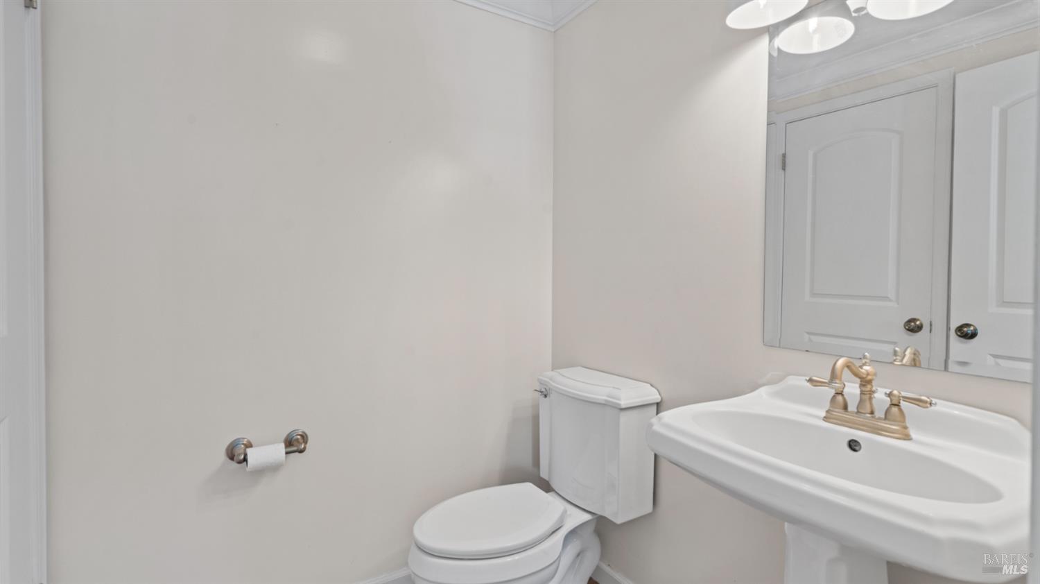 2306 Maher Drive Santa Rosa, CA 95405 - Photo 15 of 28 a bathroom with a sink toilet and a mirror