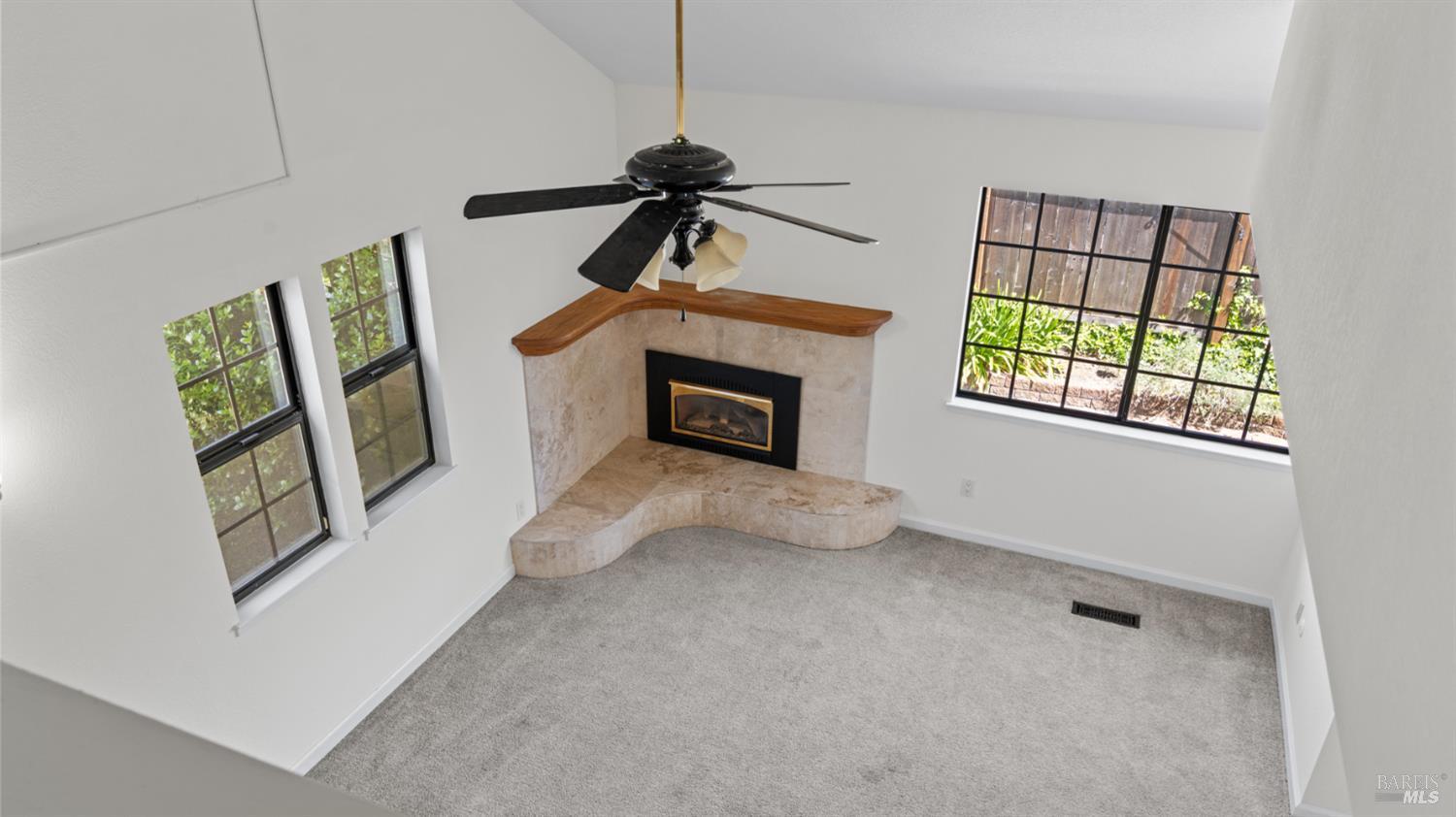 2306 Maher Drive Santa Rosa, CA 95405 - Photo 16 of 28 a living room with furniture and a fireplace