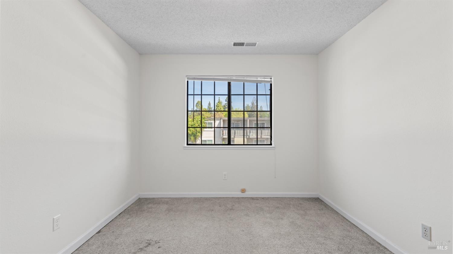 2306 Maher Drive Santa Rosa, CA 95405 - Photo 22 of 28 an empty room with a window