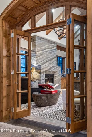 a backyard of a house with lake and a yard