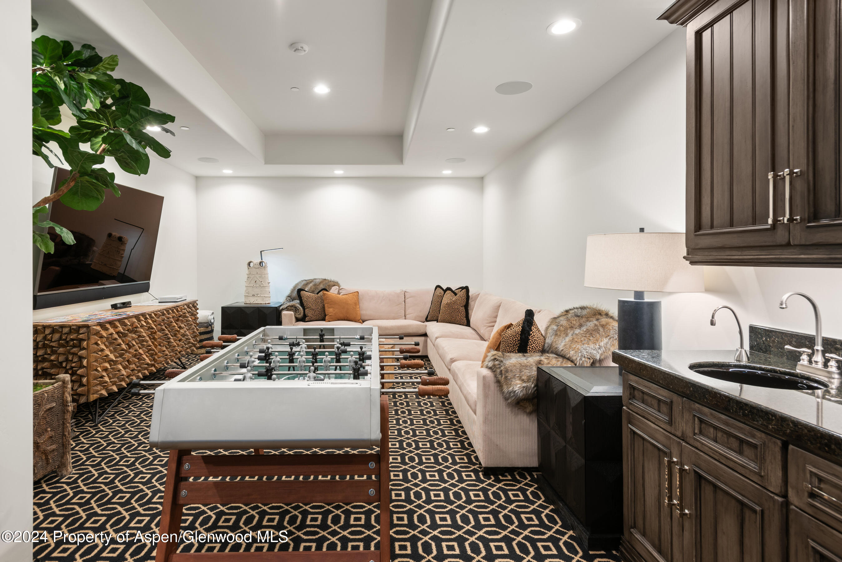1449 Crystal Lake Road Aspen, CO 81611 - Photo 29 of 82 a kitchen with a sink and a stove top oven