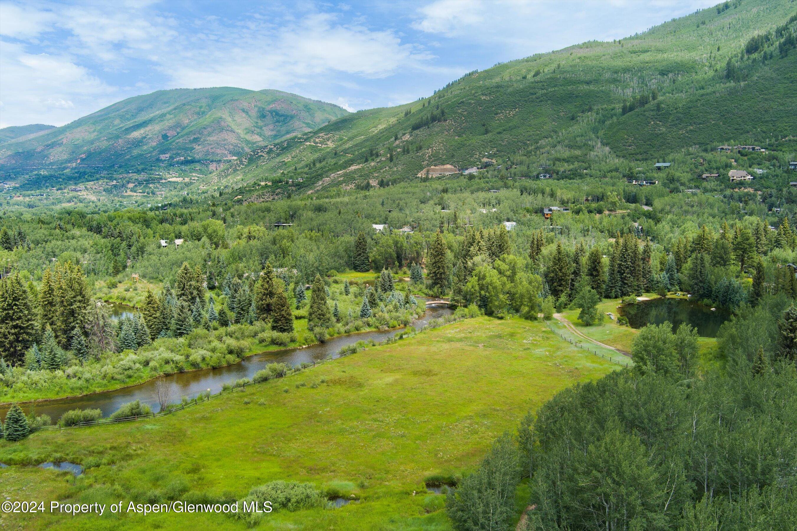 1449 Crystal Lake Road Aspen, CO 81611 - Photo 73 of 82 a view of an outdoor space and a yard