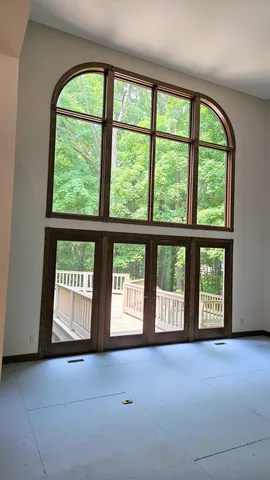 an empty room with windows