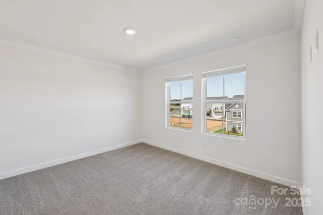 a bathroom with 2 sink and a mirror