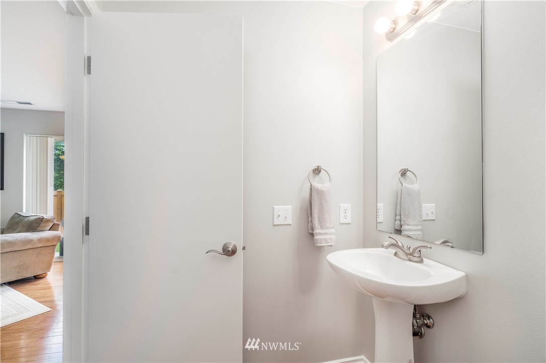 3719 154th Place Southeast Bothell, WA 98012 - Photo 13 of 37 a bathroom with a sink and a mirror
