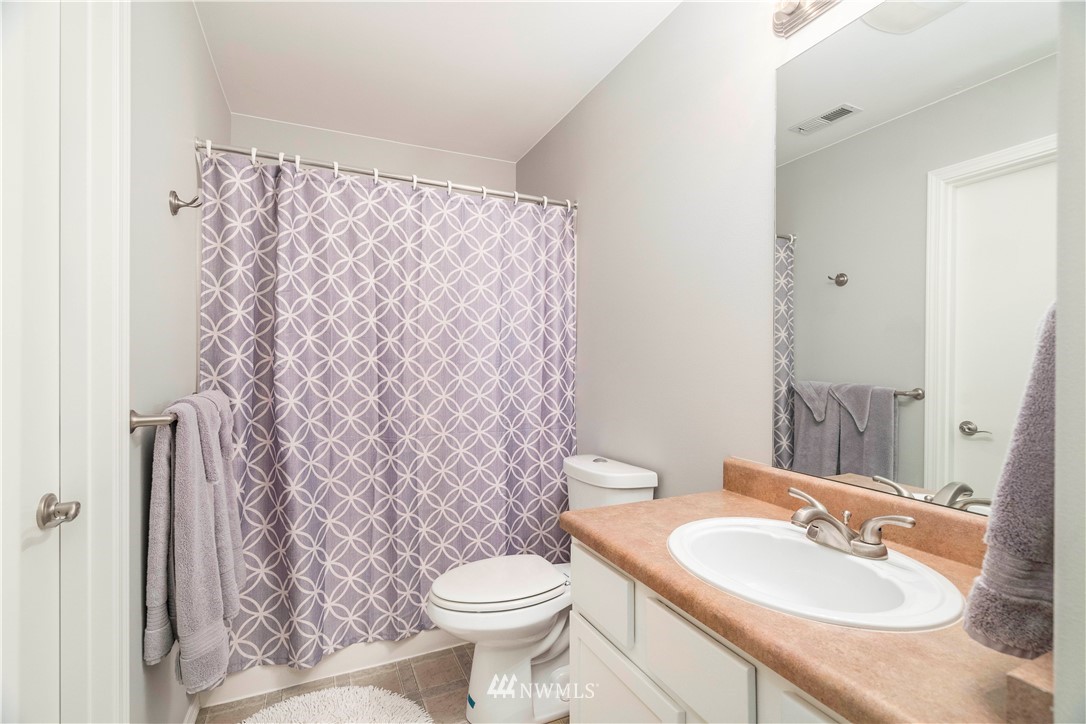 3719 154th Place Southeast Bothell, WA 98012 - Photo 26 of 37 a bathroom with a sink and a toilet