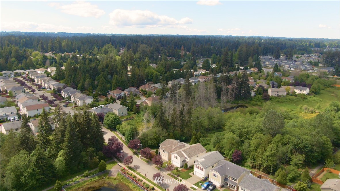 3719 154th Place Southeast Bothell, WA 98012 - Photo 30 of 37 a view of a lake with houses