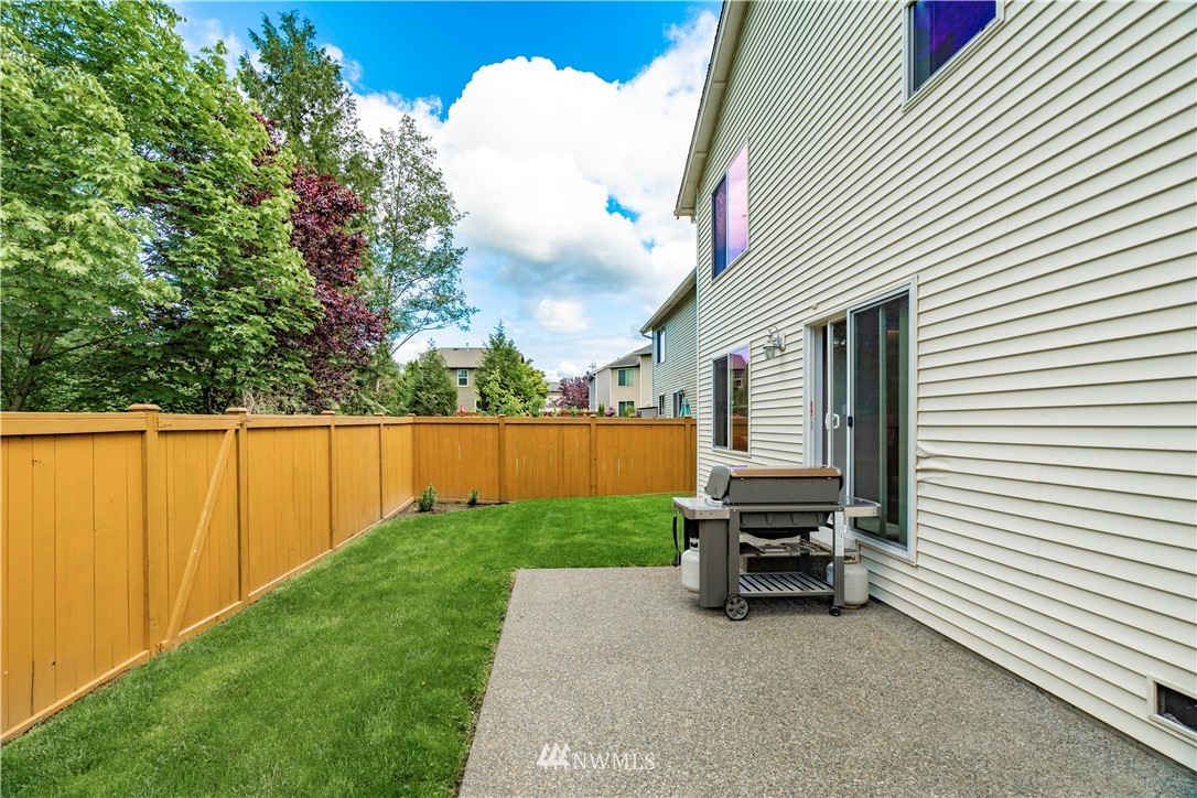 3719 154th Place Southeast Bothell, WA 98012 - Photo 32 of 37 a view of a back yard with a chair