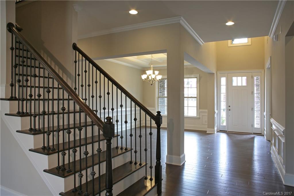 1532 Afton Way, Unit 168 Fort Mill, SC 29708 - Photo 6 of 19 a view of staircase with wooden floor and fan