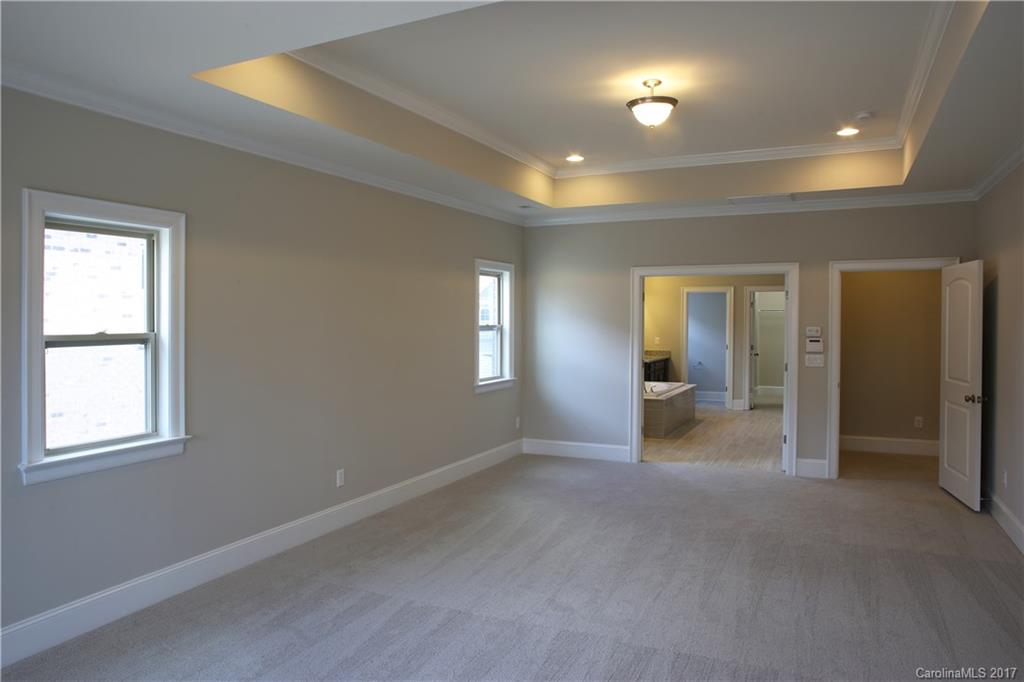 1532 Afton Way, Unit 168 Fort Mill, SC 29708 - Photo 7 of 19 an empty room with windows and entrance