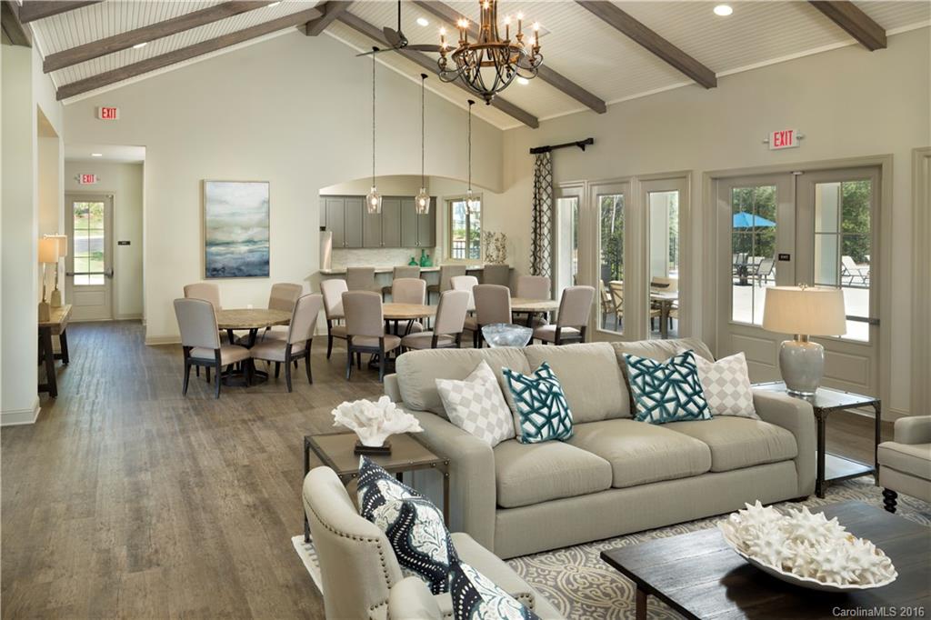 1532 Afton Way, Unit 168 Fort Mill, SC 29708 - Photo 10 of 19 a living room with furniture and a chandelier