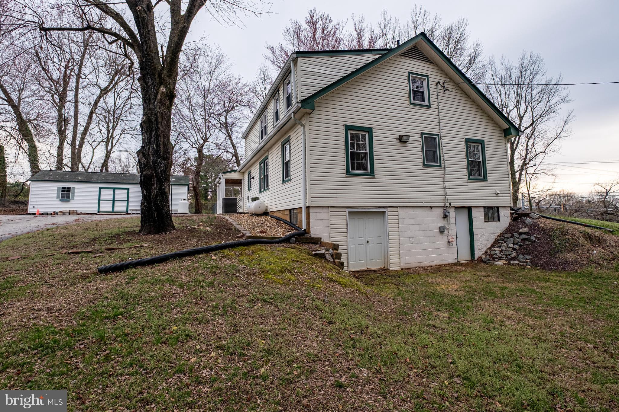 5680 Bryantown Road Bryantown, MD 20617 - Photo 2 of 35 a view of a house with a yard