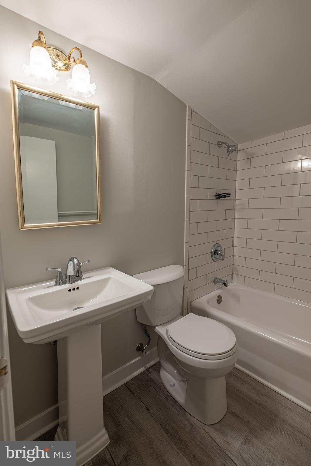 5680 Bryantown Road Bryantown, MD 20617 - Photo 26 of 35 a bathroom with a sink toilet and shower