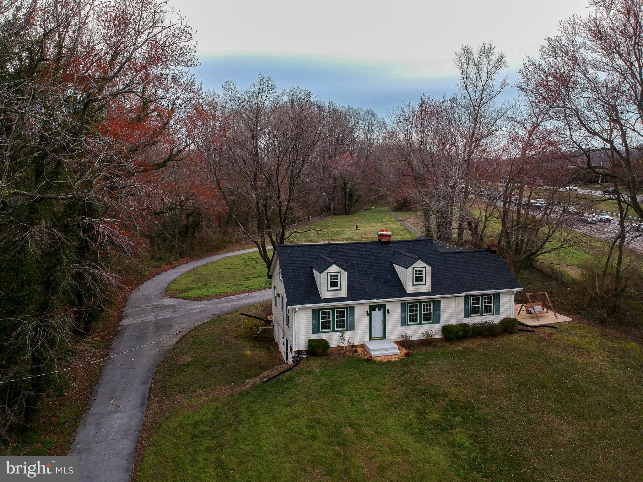 5680 Bryantown Road Bryantown, MD 20617 - Photo 31 of 35 an aerial view of a house with a big yard