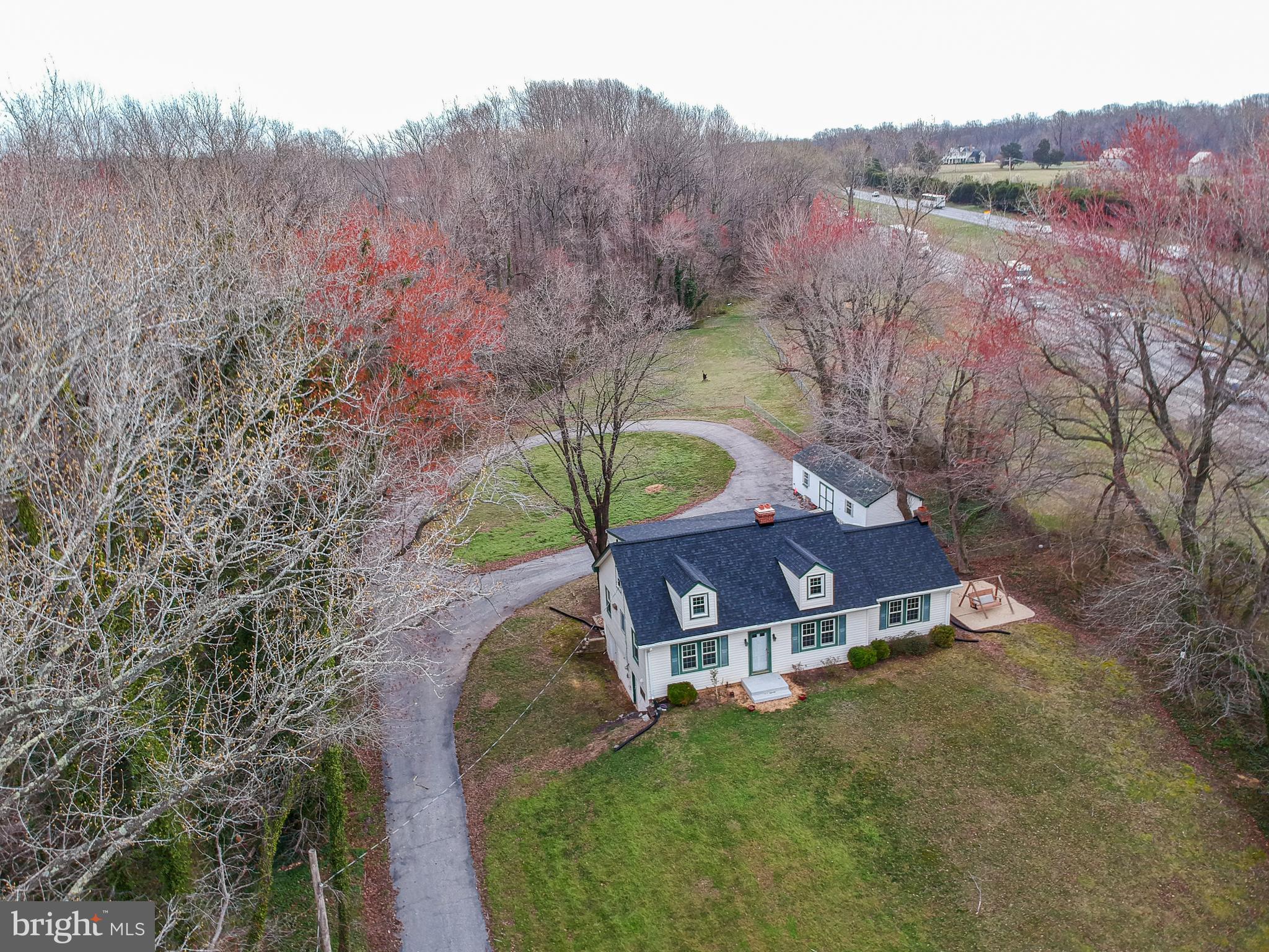 5680 Bryantown Road Bryantown, MD 20617 - Photo 33 of 35 an aerial view of a house with a yard
