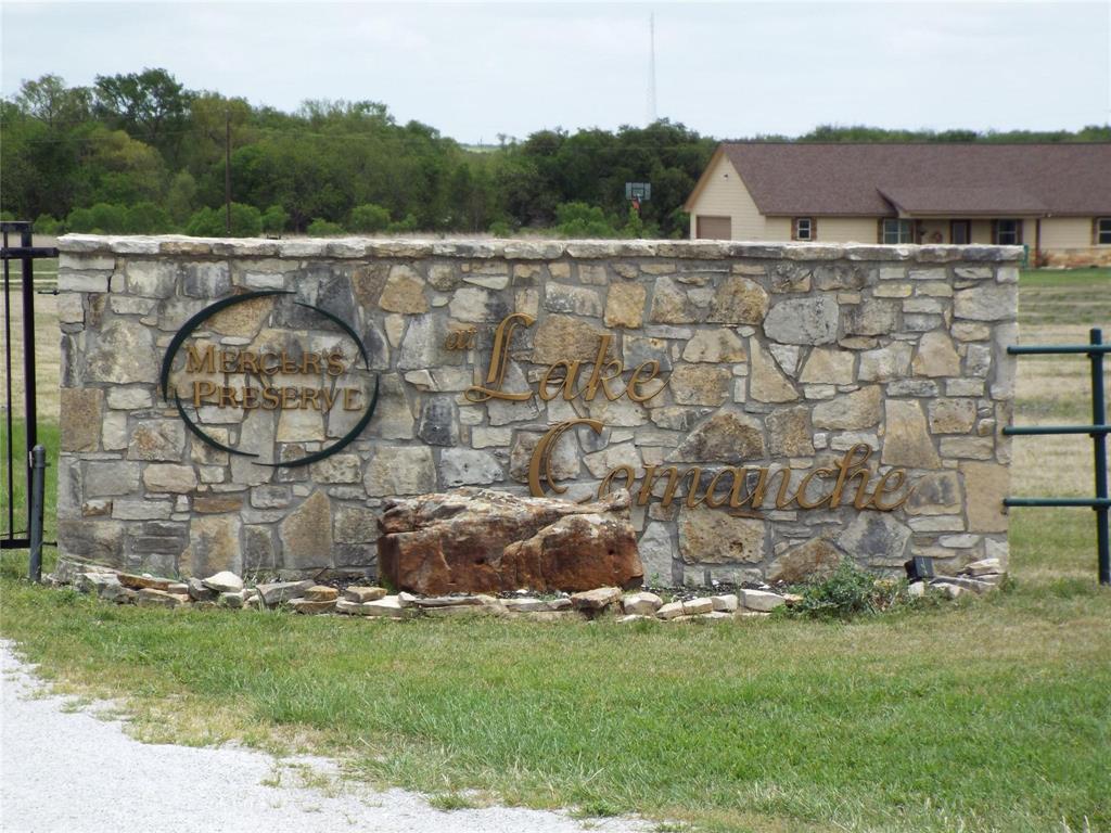 0 Mercers Preserve Road Comanche, TX 76442 - Photo 1 of 1 Community / neighborhood sign featuring a lawn