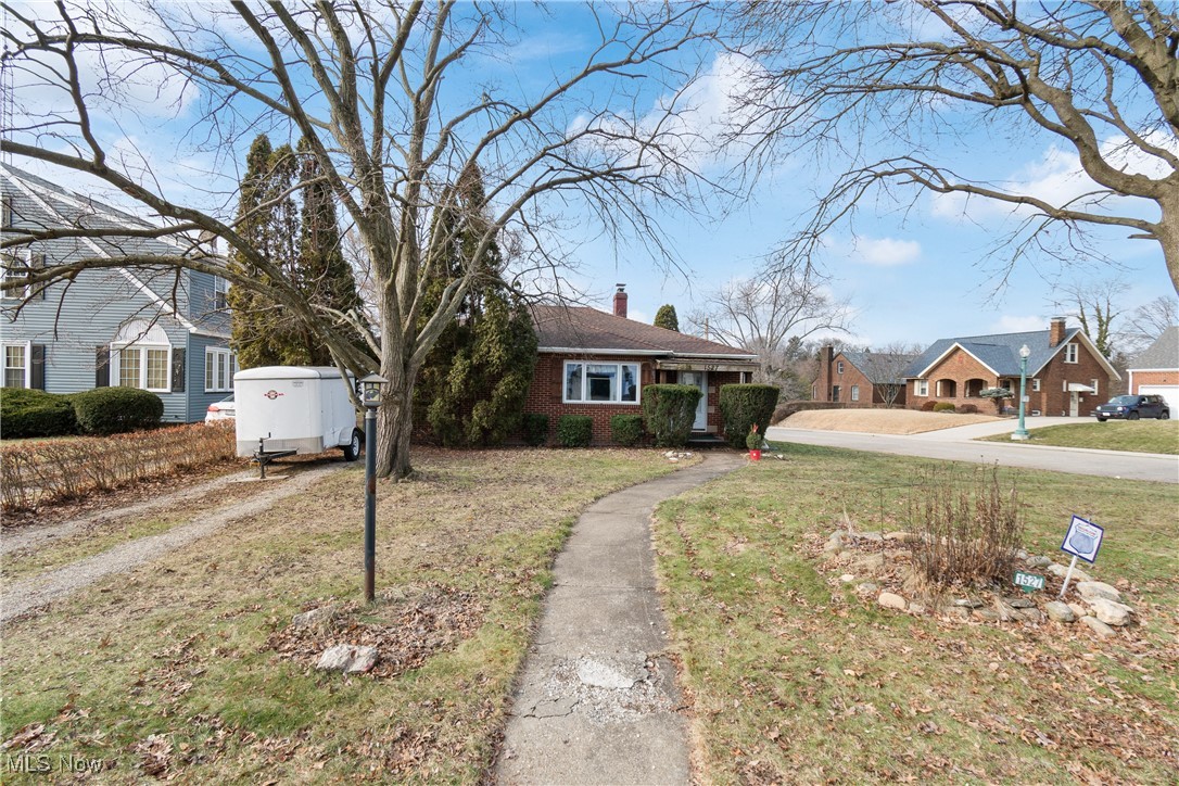 1527 Ridge Road Northwest Canton, OH 44703 - Photo 26 of 27 View of front of house with a front yard