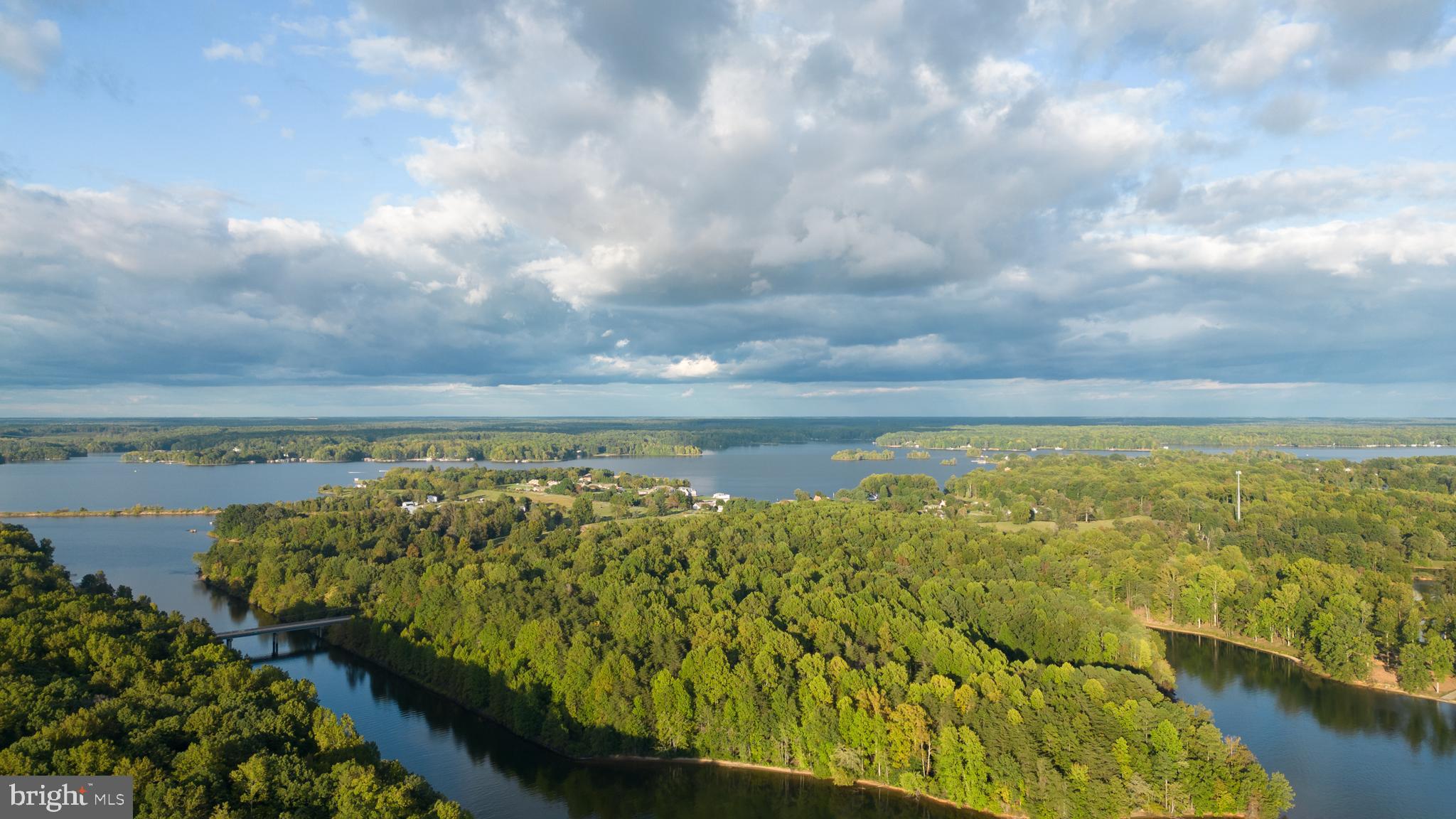 Lot 9 Carrs Bridge Road Bumpass, VA 23024 - Photo 7 of 9 a view of a lake with a city