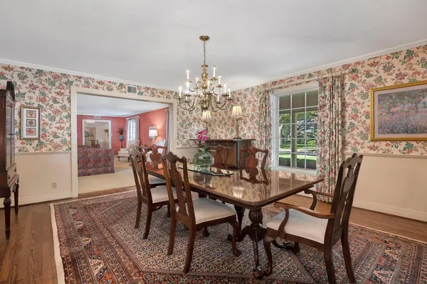 a kitchen with white cabinets and center island