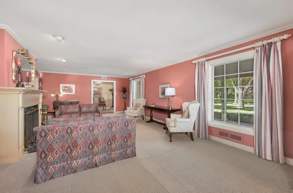 a bedroom with a bed and lamp