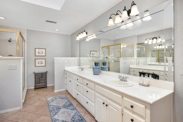 a view of a bathroom sink and mirror