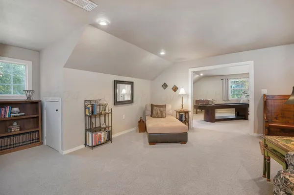 a room with furniture and window