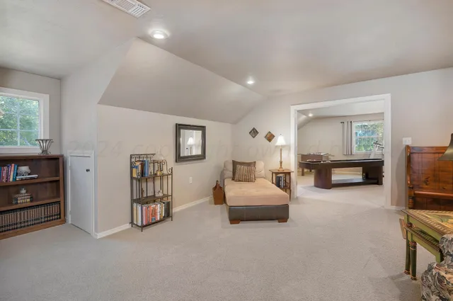 a room with furniture and window