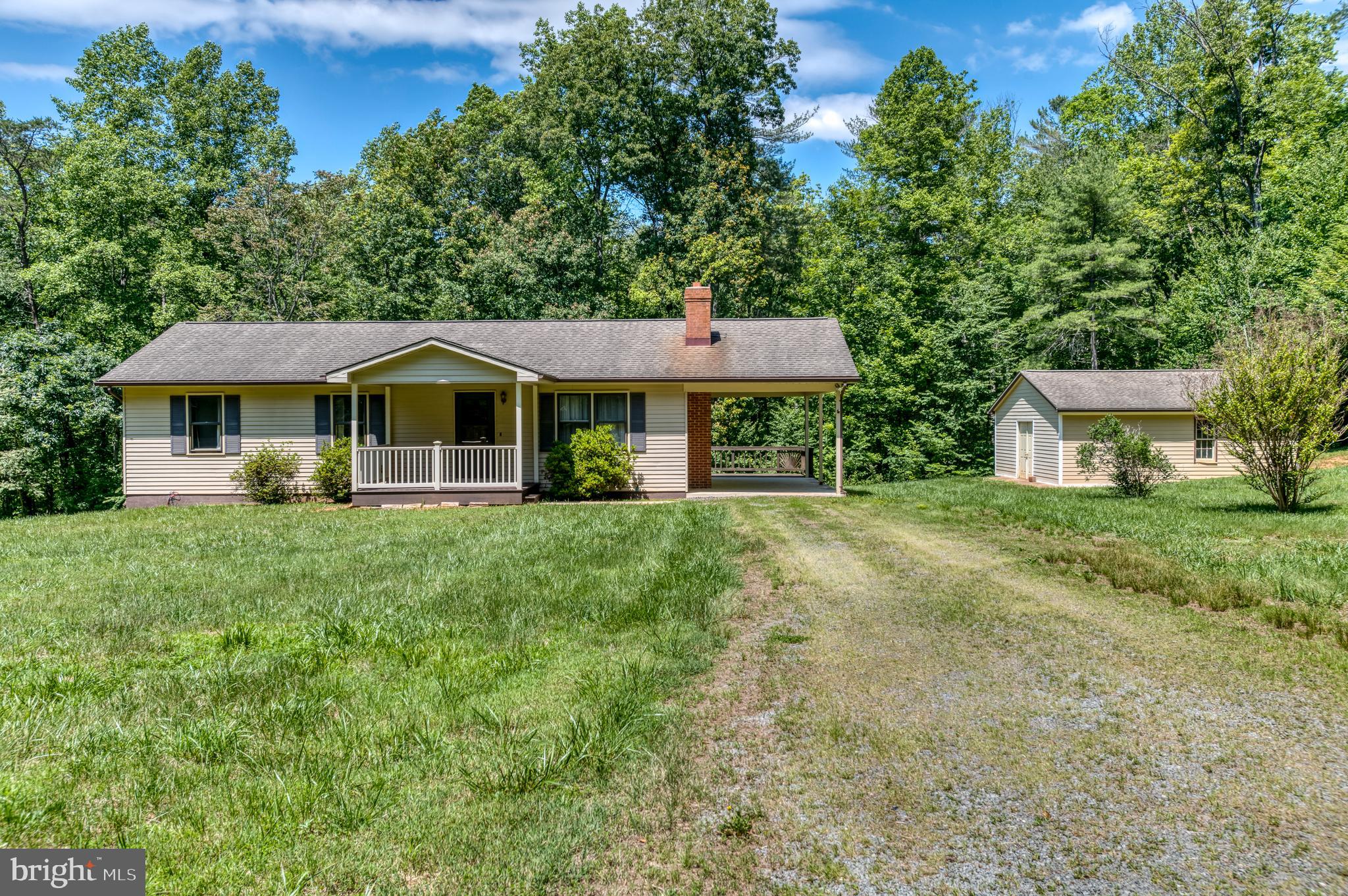 803 Weaver Hollow Road Banco, VA 22711 - Photo 31 of 67 a front view of a house with a yard