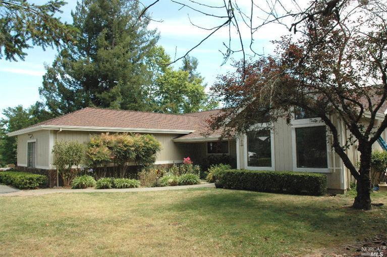 2155 Schaeffer Road Sebastopol, CA 95472 - Photo 1 of 1 a front view of house with yard and green space