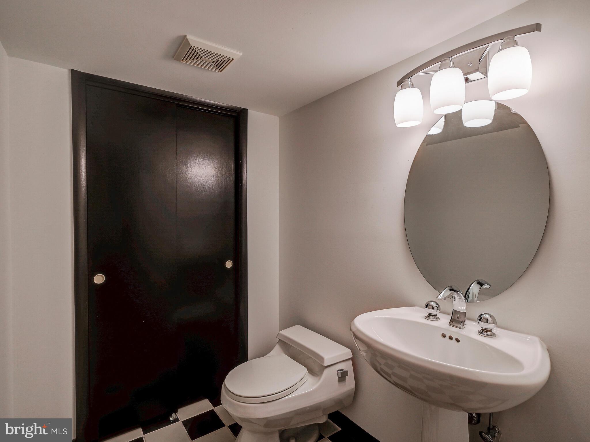 3420 Garrison Farms Road Baltimore, MD 21208 - Photo 32 of 45 Lower Level Powder Room