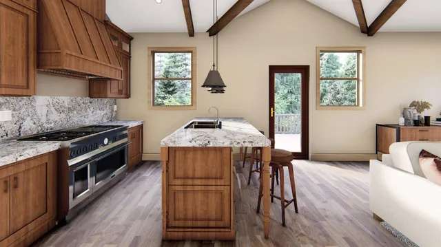 a kitchen with stainless steel appliances granite countertop a stove top oven a sink dishwasher and wooden floor