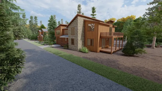 a view of a house with a yard