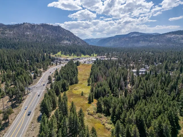 a view of a lake in middle of the town